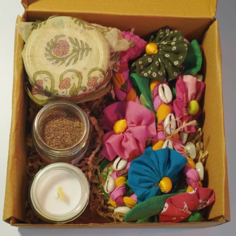 Use Me: Eco Diwali Gift Box 1 | Upcycled Flower Toran | Soy Candle Jar | Dates Jar with Filling | Coffee & Orange Body Scrub.
