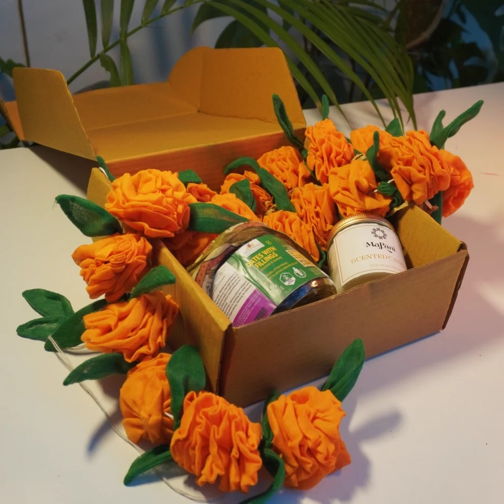 Use Me:Eco Diwali Gift Box 2 | Genda/Marigold Cloth Flower Garland | Soy Candle Jar | Dates Jar with Filling.